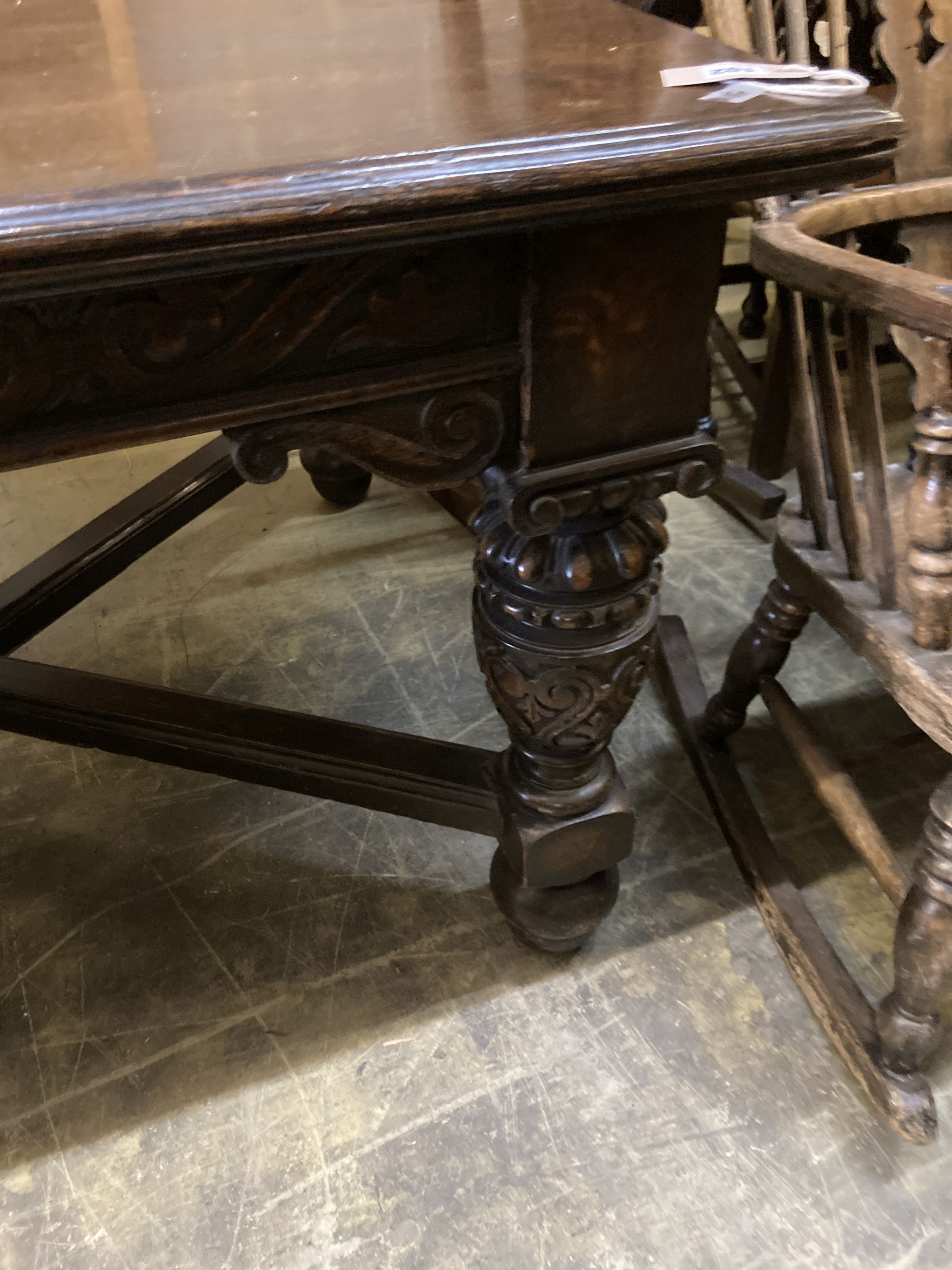 A Victorian oak refectory dining table, on carved bulbous legs, length 244cm, depth 104cm, height 74cm